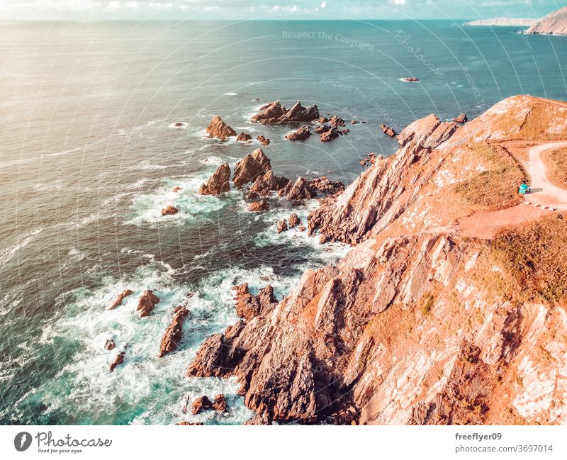 Landscape of a rocky cliff near the sea from a drone landscape seascape copy space loiba galicia cliffs rocks ocean atlantic tourism spain horizon clean