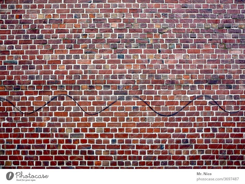 Wavy line on a brick wall Wall (building) Wall (barrier) Brick wall House (Residential Structure) masonry Old building Facade Structures and shapes bricks Red