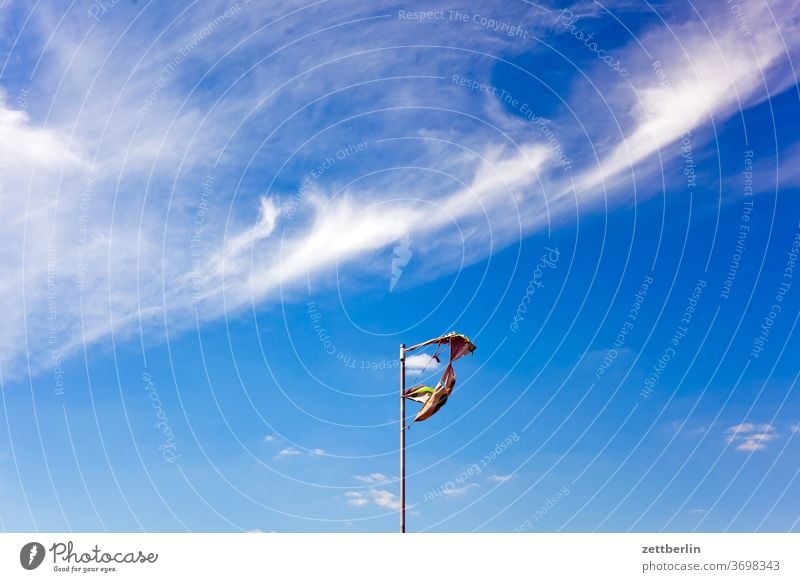 Shredded flag altocumulus Flag Flagpole Scrap Worm's-eye view Sky background Climate Climate change Deserted Meteorology Romance romantic Summer Copy Space Blow