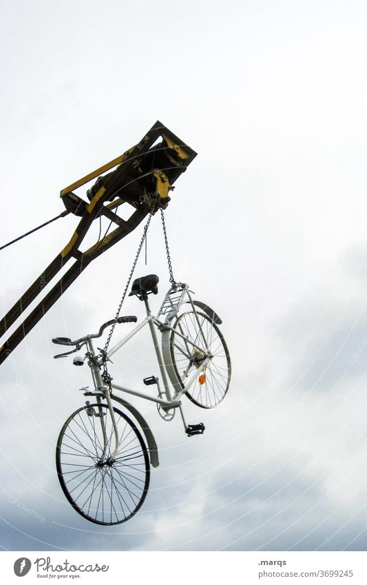Counterweight | wheel to crane Bicycle Crane Hang Sky Clouds Construction site Construction crane Tall