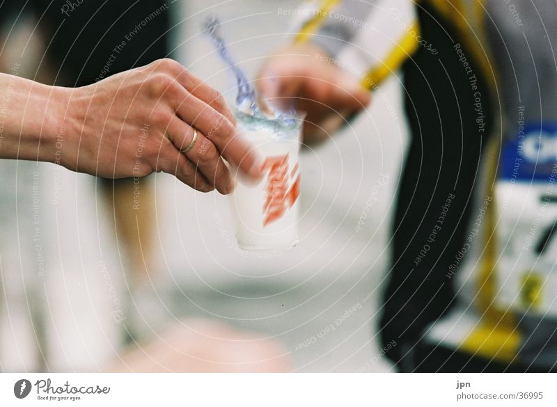 Helping Hand Marathon Beverage Mug Motion blur Exhaustion Extreme sports catering station Detail Water Inject Movement Rich stretch