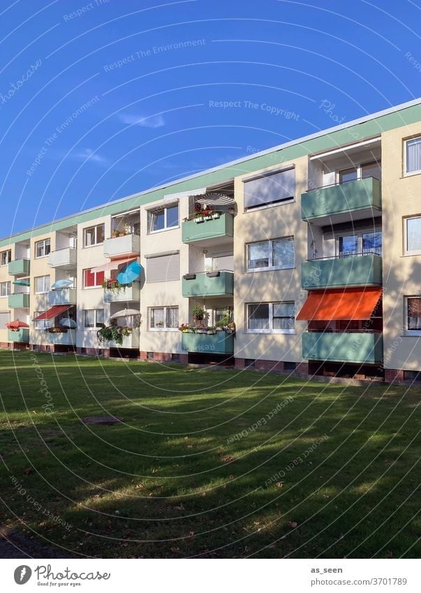 Vacation on Balconies Sunshade Architecture fifties public housing House (Residential Structure) Facade built Town Balcony Colour photo Window Day Deserted