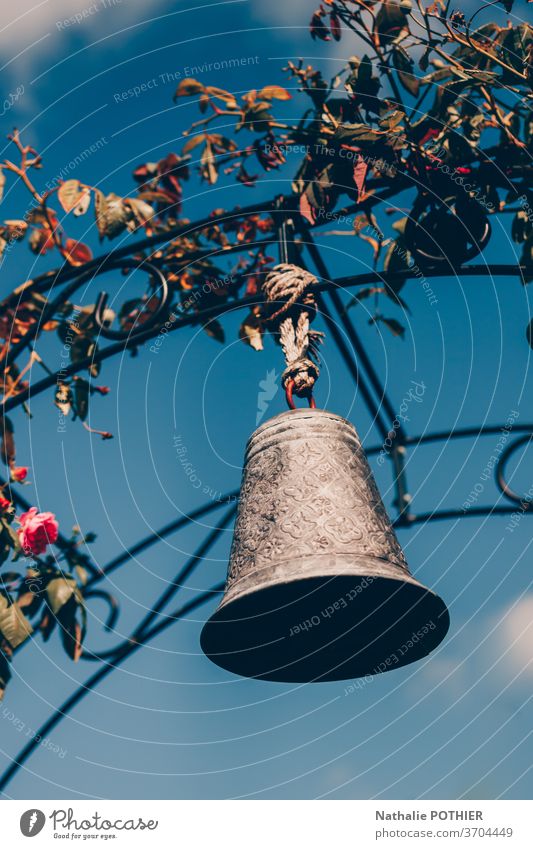 Bell hanging a hoop in the garden bell sky leaves metal decoration antique vintage europe Antique Retro Decoration Style Exterior shot Metal Old Ancient
