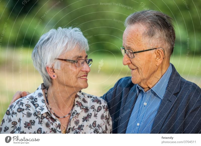Retired couple in love Married couple Spouses 80 years old loving Jacket Blouse Glasses Glasses wearers Face to Face healthy Life path Retirement Familiarity