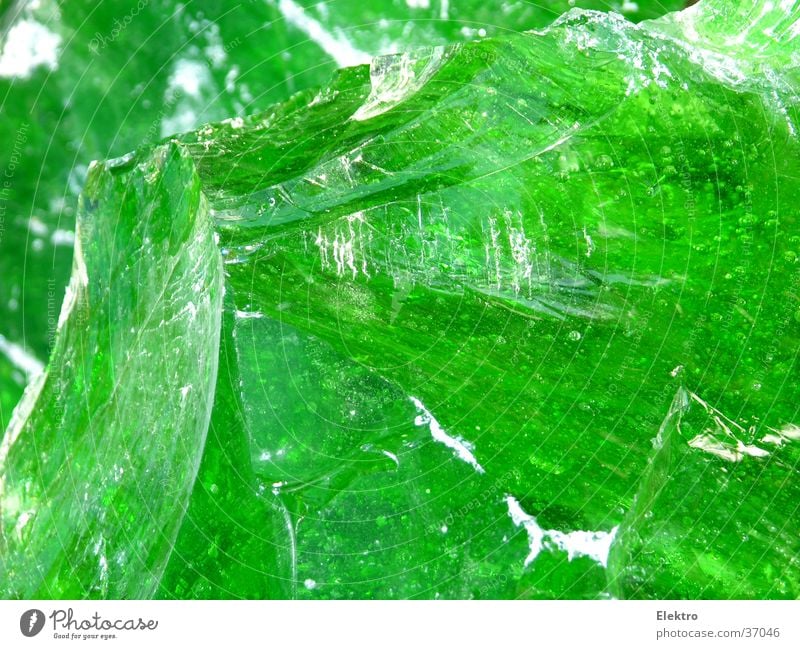 Glass splinter Glass for recycling Glass blower Glazier Fragment Splinter Green Transparent Lamp Lighting Recycling Glimmer Glittering Fiber optics Tactics