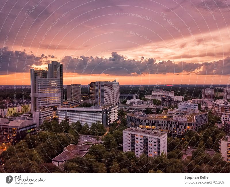Munich from above, a droneshot in the colorful evening. sunset aerial office cityscape skyline dawn colors amazing special clouds high angle tree urban working