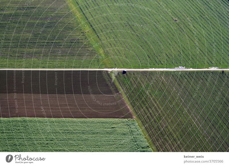 Aerial view of agricultural areas in green and brown aerial photograph arable land Agriculture fields quality structure division Bird's-eye view Abstract