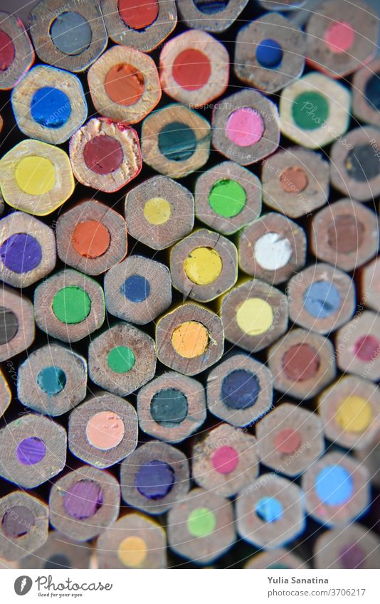 selective focus on the back side of pencils draw art design handcraft paint artist designer color yeallow blue green shade red purple colorful multiple