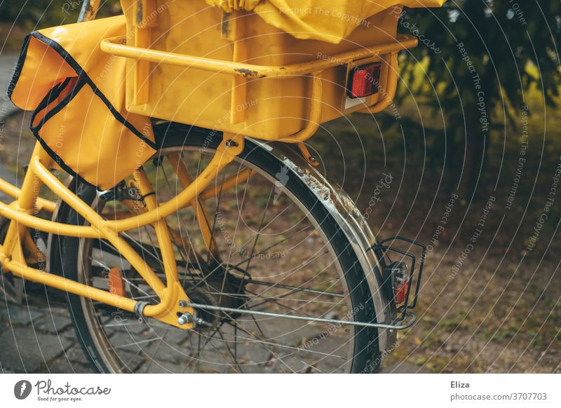 A yellow mail bike Bicycle Mail Postman postal delivery Postal Bicycle Yellow German Post