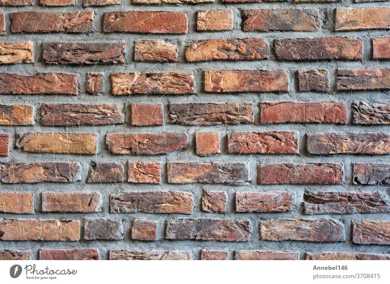 Brick wall dark red colored for background texture, modern retro style old brick surface rough pattern brickwork structure grunge brown concrete architecture