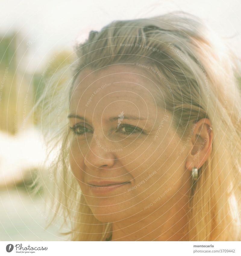portrait of a young lady in soft light Serene balanced Looking Long-haired Adults natural Blonde Human being 30 - 45 years Young woman Feminine Life Authentic