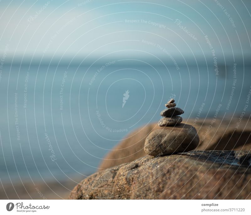 Cairn on the beach Stone Rock balance stones Ocean Finland Stack Tower Manmade structures built structure Zen Yoga