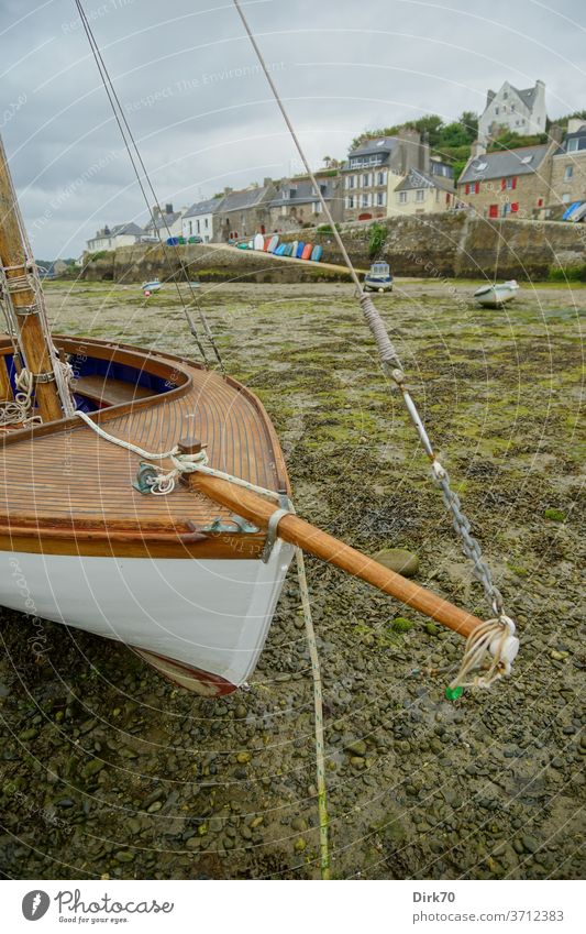 A sailing boat, dried out at low tide in the port of Le Conquet in Brittany Harbour Exterior shot Navigation Colour photo Port City Day Watercraft Ocean