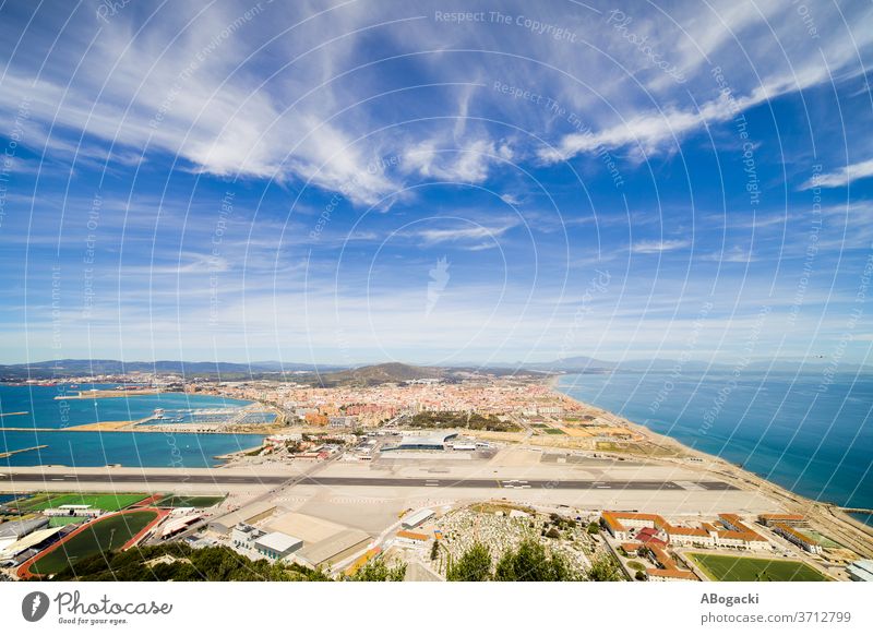 Gibraltar Airport Runway and La Linea Town airport runway gibraltar airstrip landind strip town above city spain europe travel tourism view site tourist