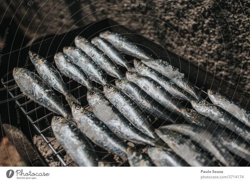 Fish on barbecue grill sardines Grill grilled Grilled fish Barbecue (apparatus) Barbecue (event) BBQ season Charcoal (cooking) grilled meat Exterior shot Summer