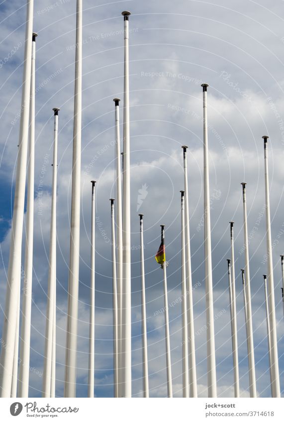subtle flagging Flagpole Many Unused German Flag Decent Long Thin Sky Clouds 1 reserved