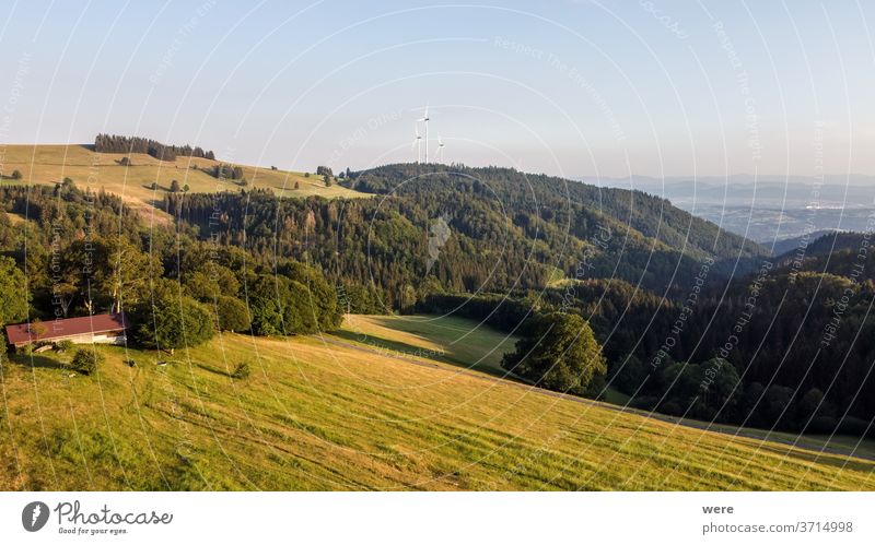 Panorama at sunset from the mountains of the Black Forest near Gersbach over the Wehratal and the city of Wehr towards the Swiss Alps Europe Germany alps