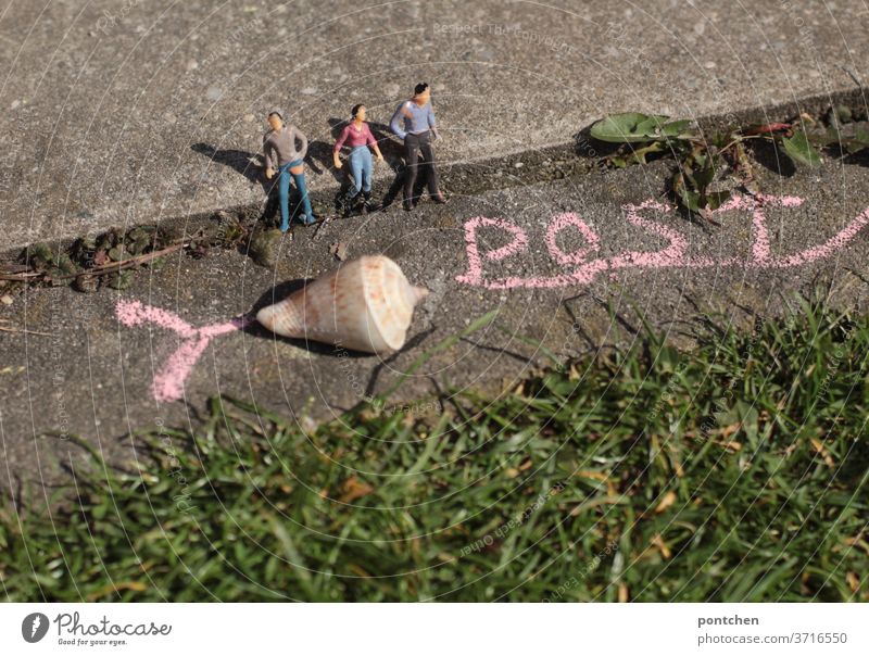 Snail mail. Symbol image. Three people waiting at the curb for a delivery of the mail. Mail snail mail Wait Slowly symbolic Snail shell Figures Small Miniature