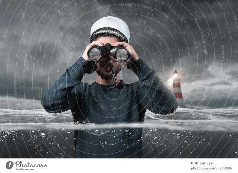 shipwrecked helmsman standing under water and observing the rock in the water with binoculars Adventure on one's own Binoculars Gray boat captain Coast
