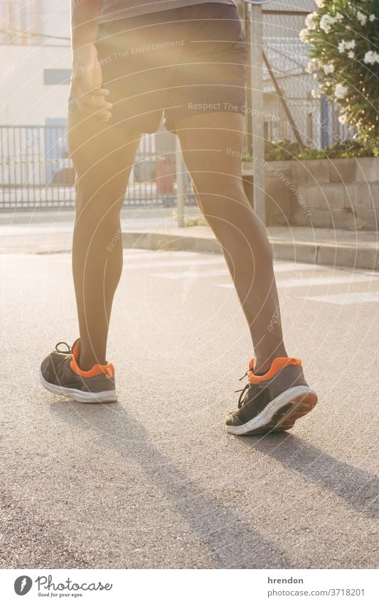 Close-up of a man legs running walking unrecognizable person lifestyle sunlight exercising outdoors healthy lifestyle shoe jogging sport sports clothing