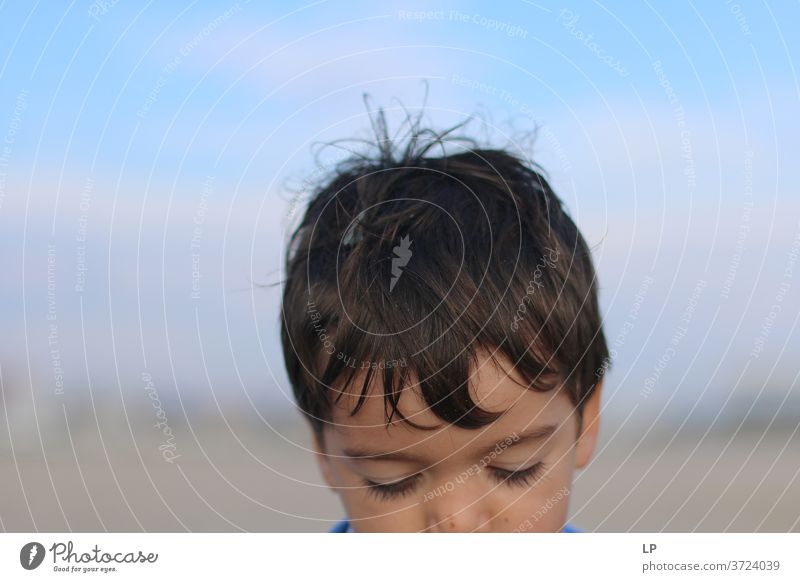 head of a sad boy Head Boy (child) Child Baby thinking looking down Sadness ideas Neutral Background Copy Space top Abstract Experimental Detail Subdued colour