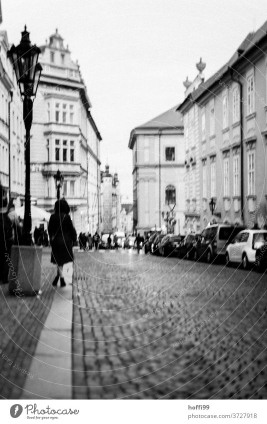 Old town - wait what comes Cobblestones Wait Night life Prostitute prostitution streetwalk Available for purchase waiting Prague Street Gray Human being