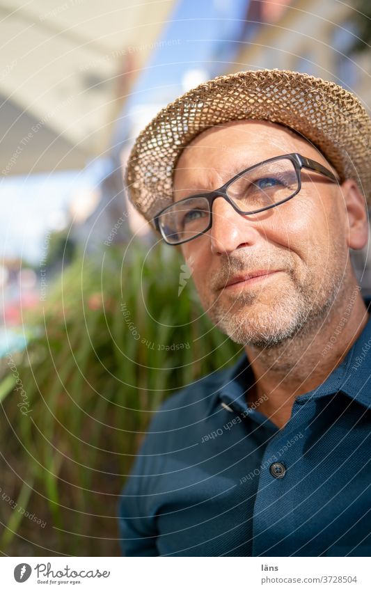 Confident man with straw hat Man Individual confident Contentment Calm Relaxation Straw hat Person wearing glasses Upward Designer stubble optimistic