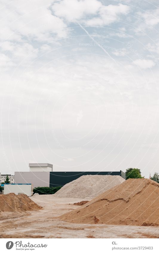 sand and stone Sand Sandheap Stone Pile of stones Industry Sky Hall Industrial site Industrial zone Industrial area