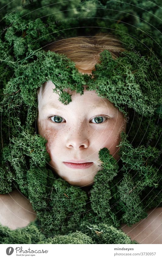 Girl in the moss Iceland Moss landscape portrait green creative portraits Freckles peer Hide Hiding place Nature Research Comprehend Elf Infancy girl silent