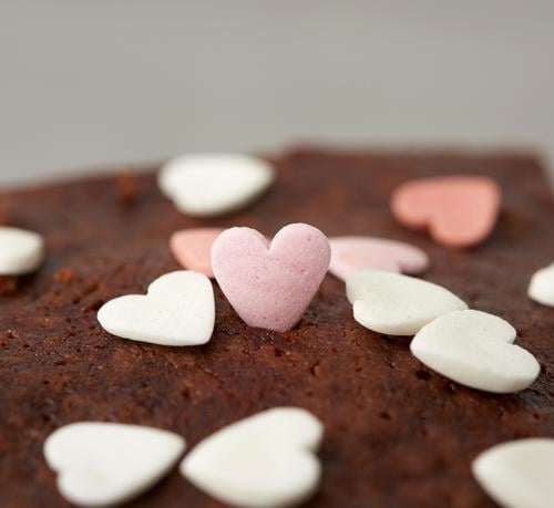 heart-shaped sugar topping on brownie chocolate cake sprinkling bake baked bakery baking black closeup cocoa cooking cuisine dark delicious dessert eat food