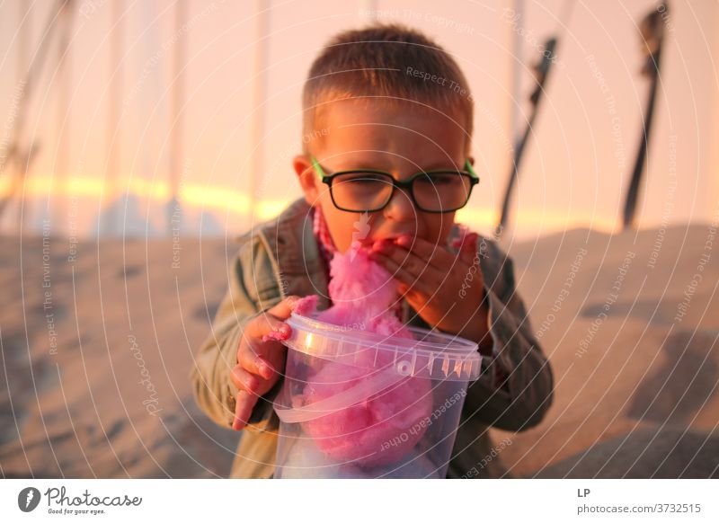 child eating candy floss moment Happiness Childhood dream Childhood memory Children's game childhood glasses positive emotion Positive Humor hilarious funny,"