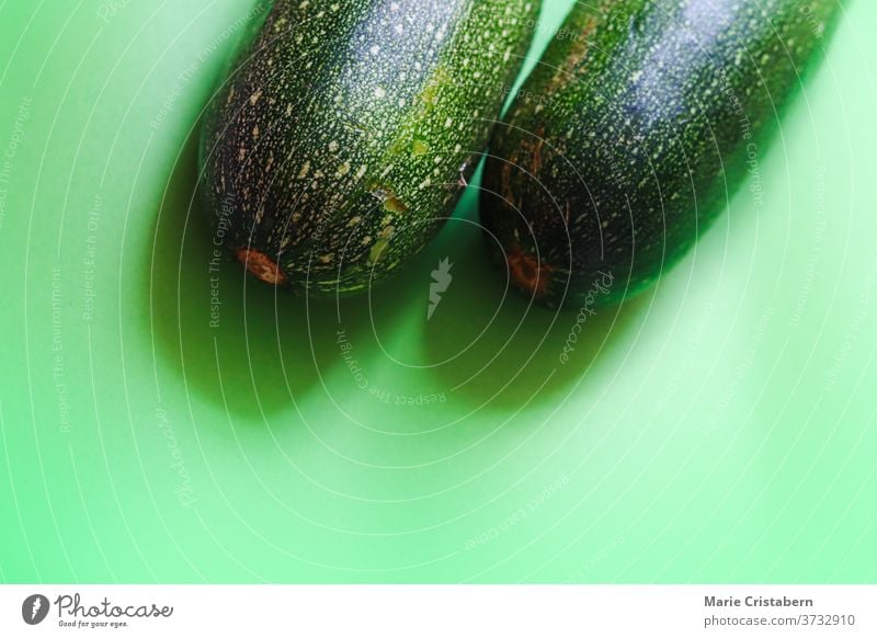 Close up of fresh green zucchini, showing concept of veganism, nutrition and wellness food and nutrition isolated design asset food and wellness