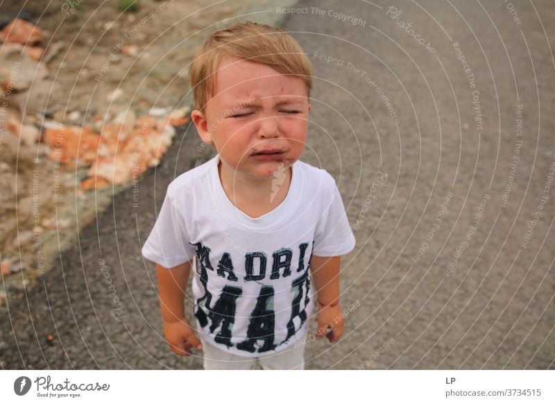 little boy crying Cry Squint Upper body Portrait photograph Exterior shot War Refugee Cry for help Body language Aggravation Anger Nerviness Disbelief Distress