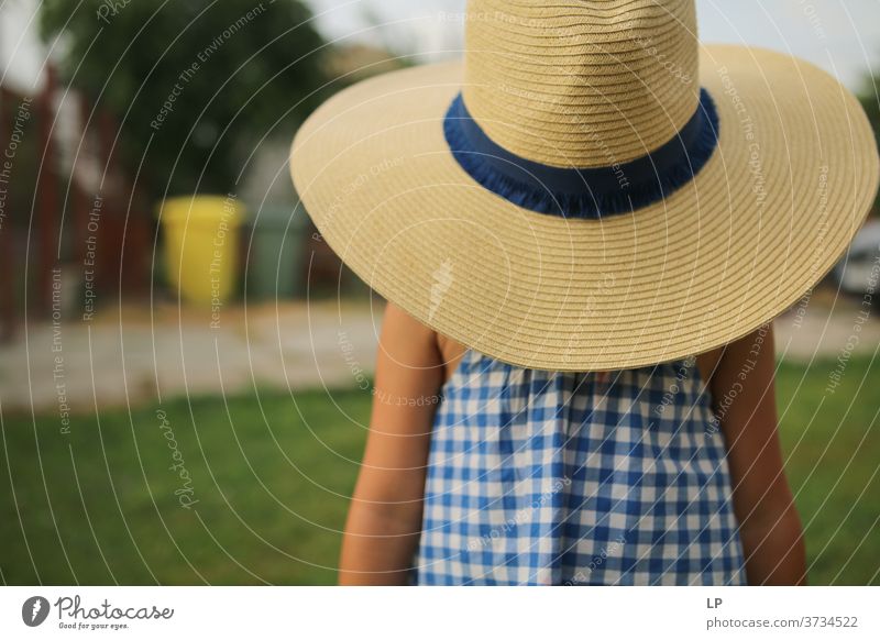 Girl wearing a big straw hat Straw hat Upper body Portrait photograph Day Structures and shapes Pattern Abstract Exterior shot Hide Desire Universe Protection