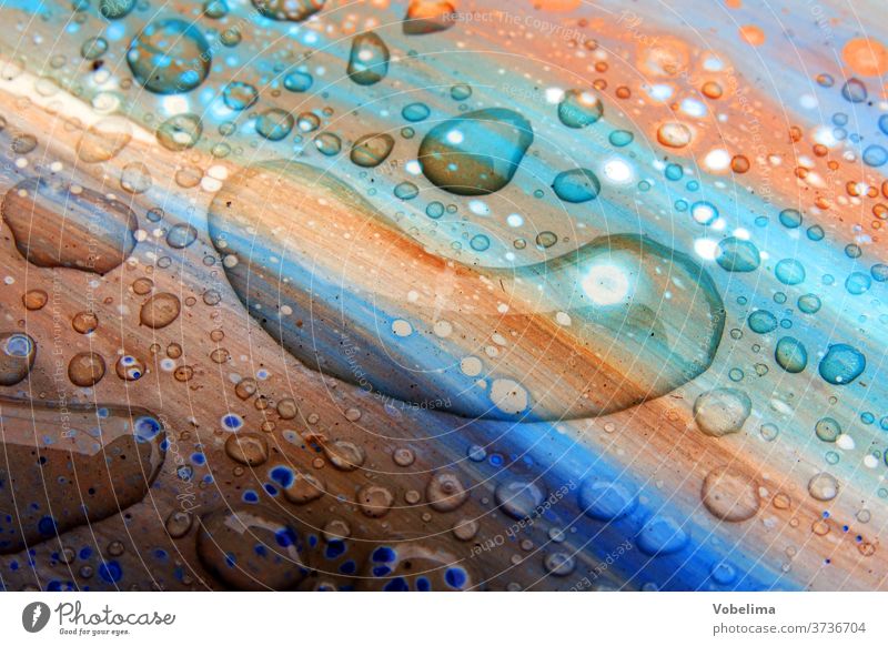 Raindrops on colourful surface Drop raindrops Water Drops of water Water wet naesse variegated Colour Brown Blue Orange green Macro (Extreme close-up) Detail