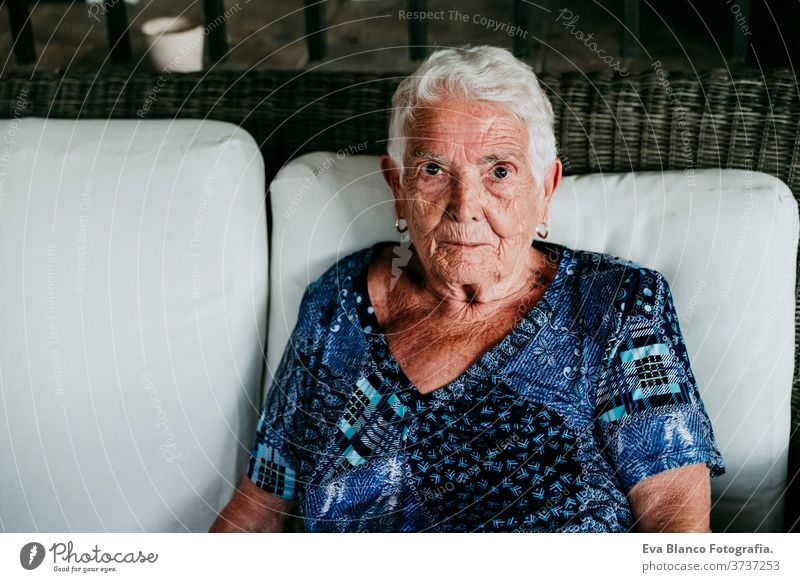Portrait Of Old Lady In Her 80s Relaxed At Home A Royalty Free Stock Photo From Photocase