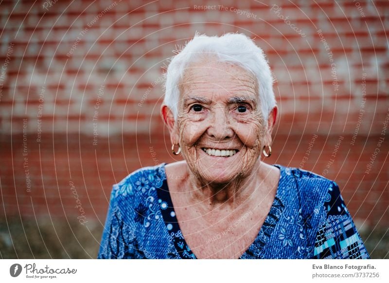Portrait Of Old Lady In Her 80s Smiling Outdoors A Royalty Free Stock Photo From Photocase