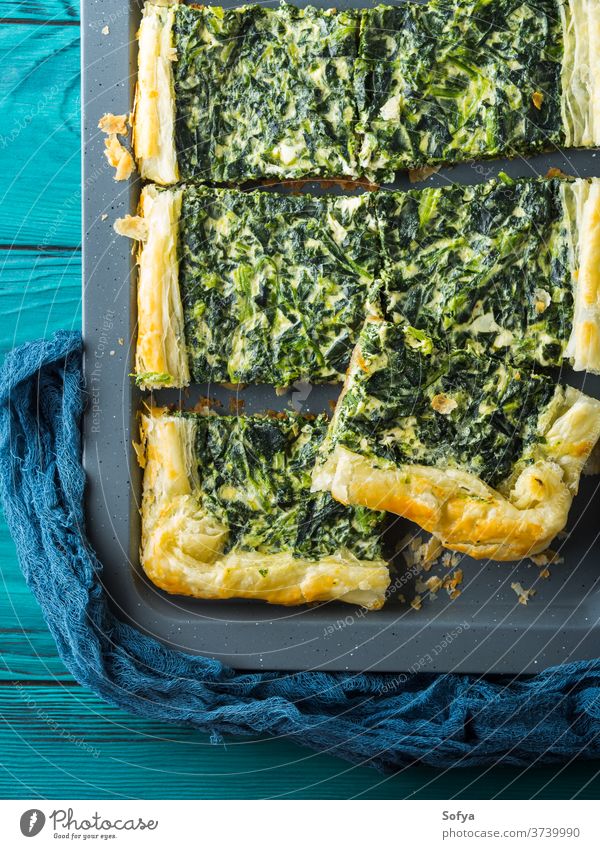Spinach savory quiche with cream cheese spinach pie green bake food meal dinner lunch roll dough pastry puff herb tray rustic vegetable vegetarian italian crust