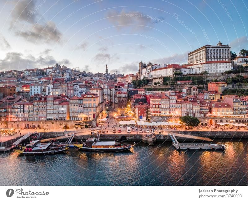 Aerial view of city center of Porto at the evening, Portugal douro porto portugal aerial cityscape ribeira night boat house architecture old windows old town