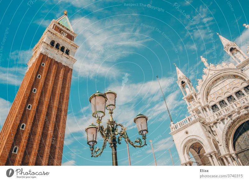 St Mark's tower, lantern and St Mark's Cathedral in front of a blue sky in Venice St. Marks Square Markusturm St. Mark's Basilica Sky Blue Italy Tourism Tower