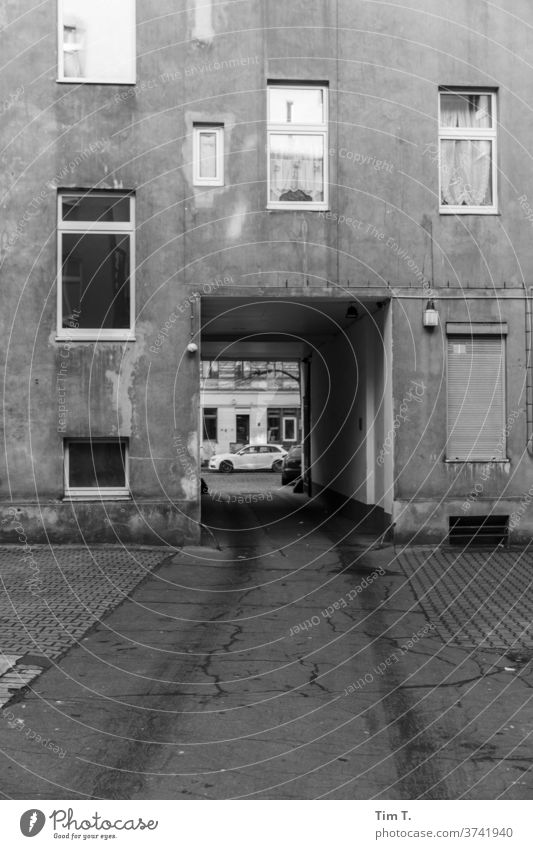 Last exit Berlin Backyard passage Black & white photo Window House (Residential Structure) Facade Town Deserted Downtown Capital city Exterior shot Day Old town