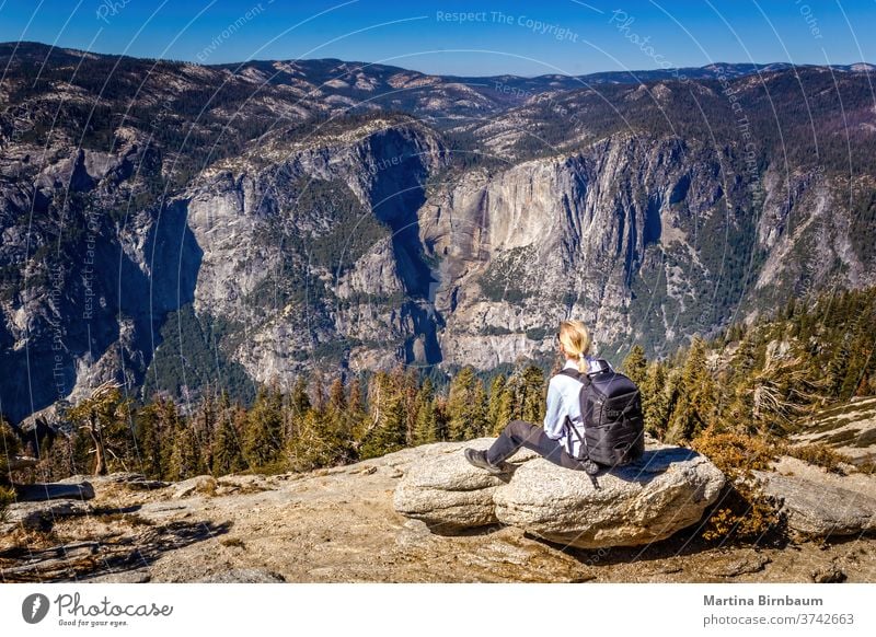 Backpacking in the Yosemite National Park, woman enjoying the view hike yosemite backpacking viewpoint vacation caucasian glacier point yosemite valley