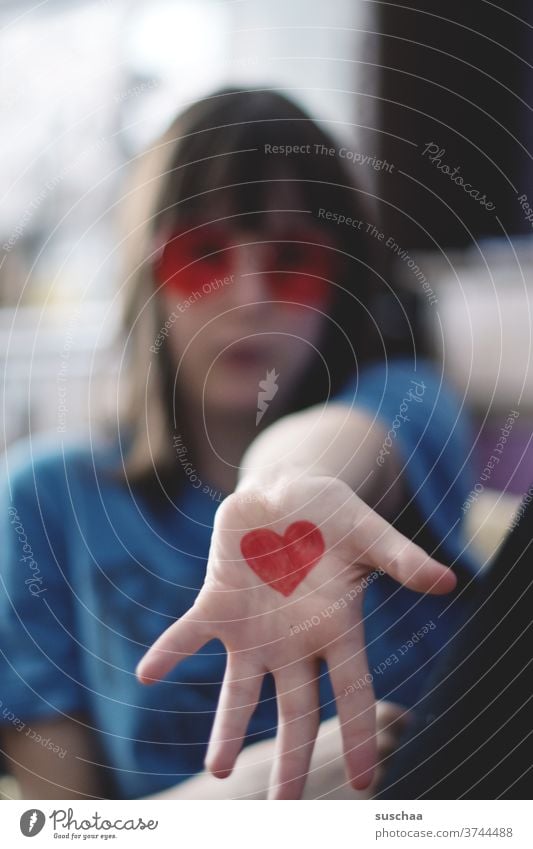 young people with painted heart on hand Heart Red Love luck Sign Sincere Affection Indicate Infatuation Romance Heart-shaped Valentine's Day Sympathy Emotions