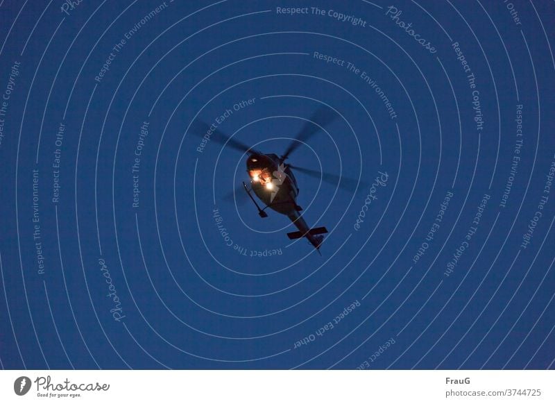 vital | rescue helicopter Helicopter Rescue helicopter Rotor blades Aviation Aircraft Flying Deployment Emergency doctor Help Lighting Headlamp Sky Blue Night