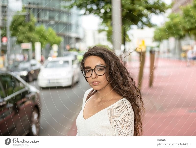 Young woman in the city Woman cheerful Transport Town Laughter portrait Beauty & Beauty Street relaxed fortunate Happy Single Smiling optimistic confident