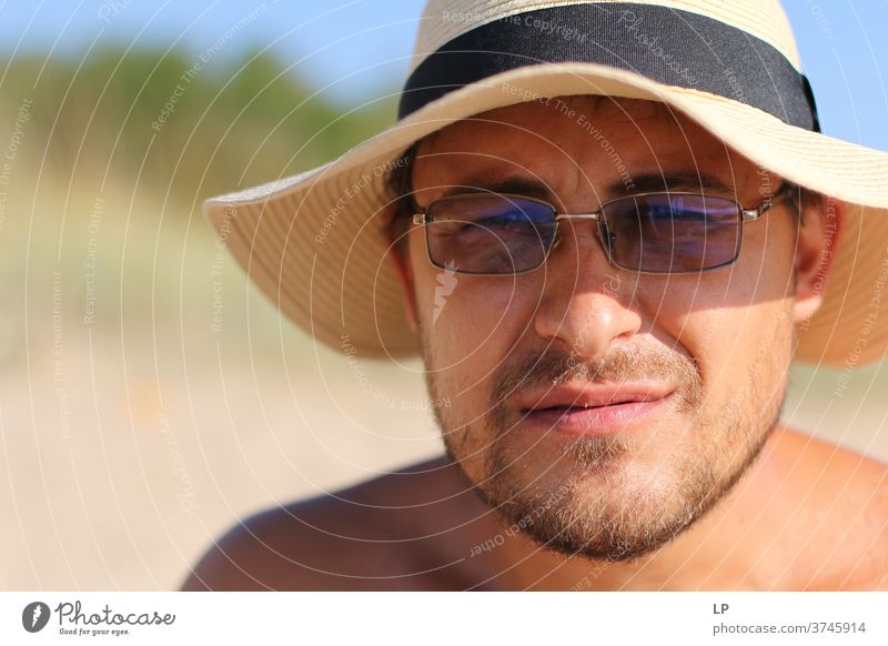 portrait of a young man waering a hat and glasses man with hat Young man Human being Exterior shot Masculine Face Life Contentment Friendliness Head Looking