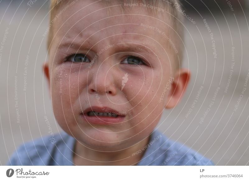 troubled child with a tear on his face Cry Crisis Orphanage Abandoned Left domestic violence Hit conflict management Bruised Hurt Dignity tantrum