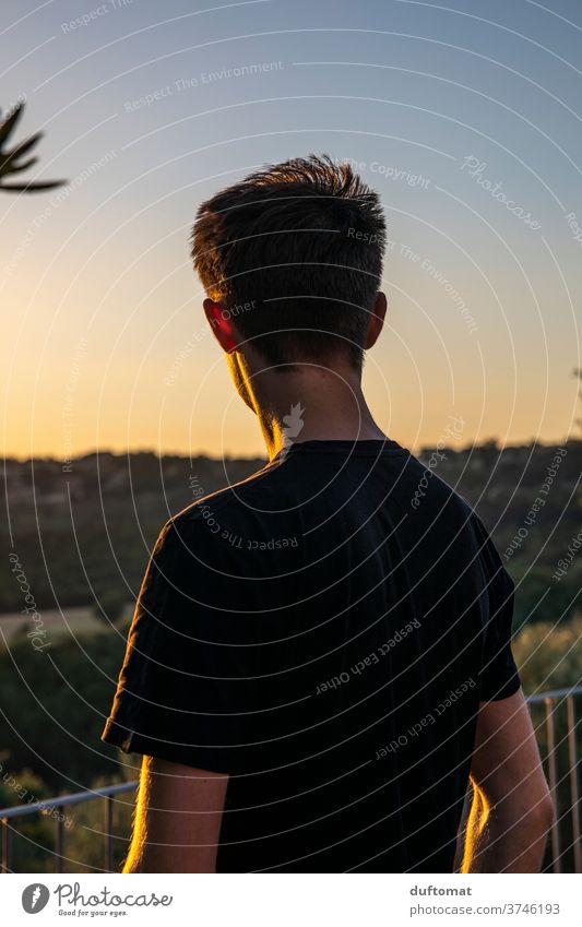 Teenager enjoys the view Italy Sunset teenager Young man Man Manly Silhouette wide far vision Vantage point To enjoy sunshine Human being Youth (Young adults)