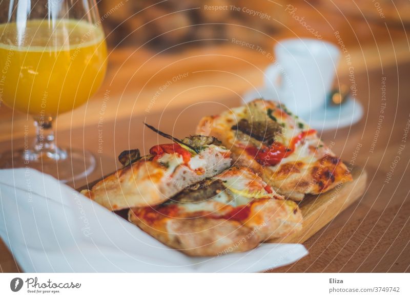 Focaccia, freshly squeezed orange juice and espresso focaccia Pizza Breakfast fresh orange juice Orange juice Delicious Meal warm Carbohydrates Nutrition
