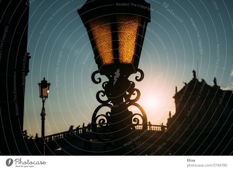 Lantern in Venice at dusk Dusk streetlamp Evening bridge conceit Sky Town squiggled Street lighting Back-light